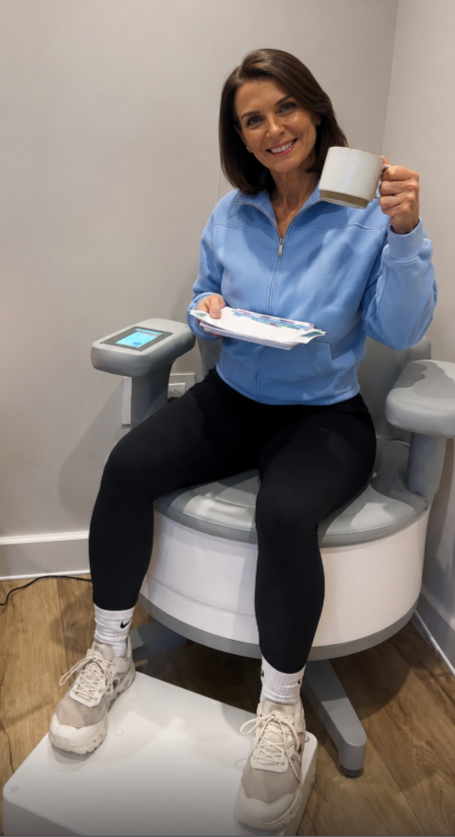 Client relaxing on the Ultra Tesla Seat